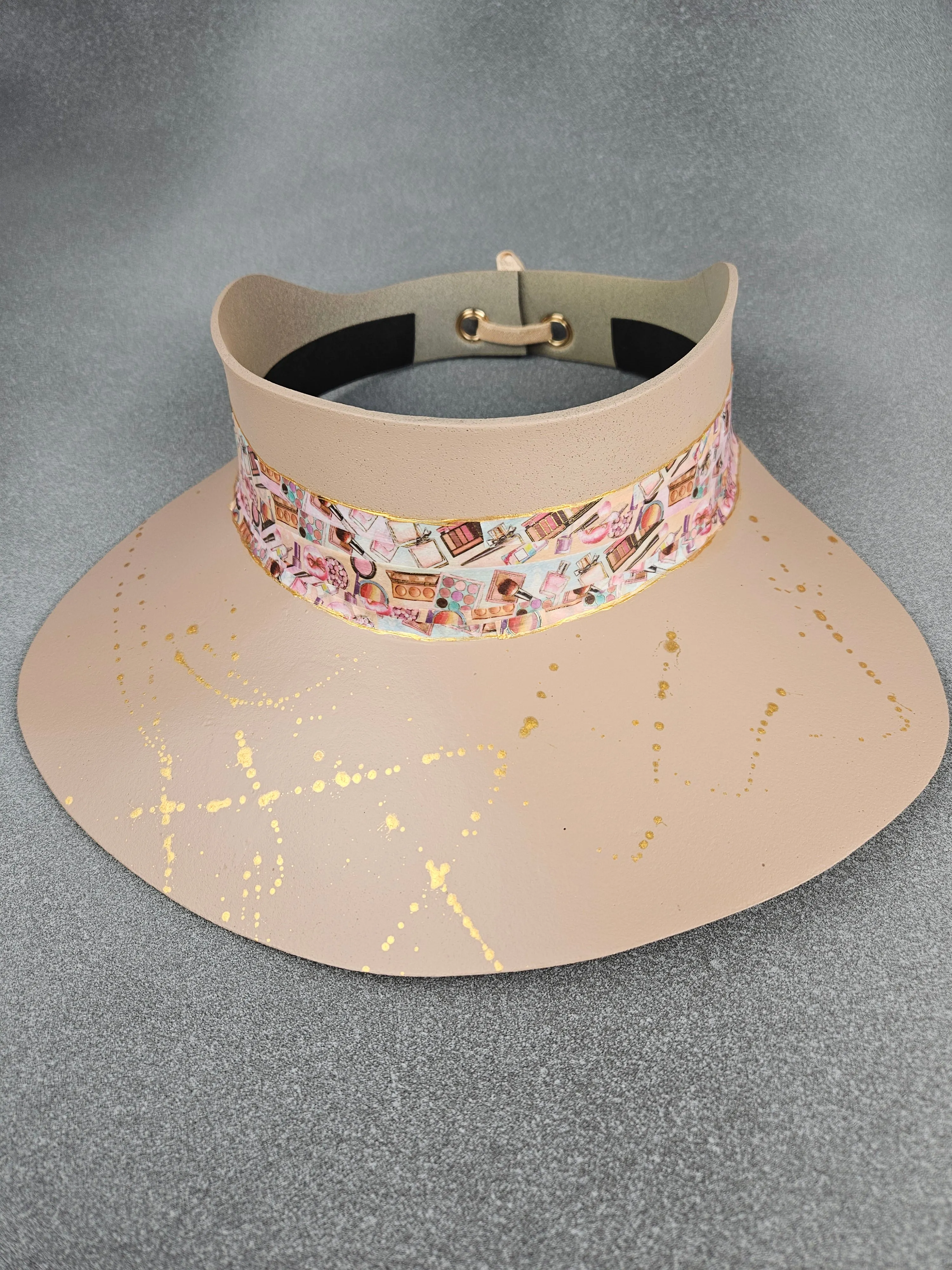 Peachy Beige "LadyEVA" Visor Hat with Cosmetic Themed Collage Band and Golden Paint Splatter Effect