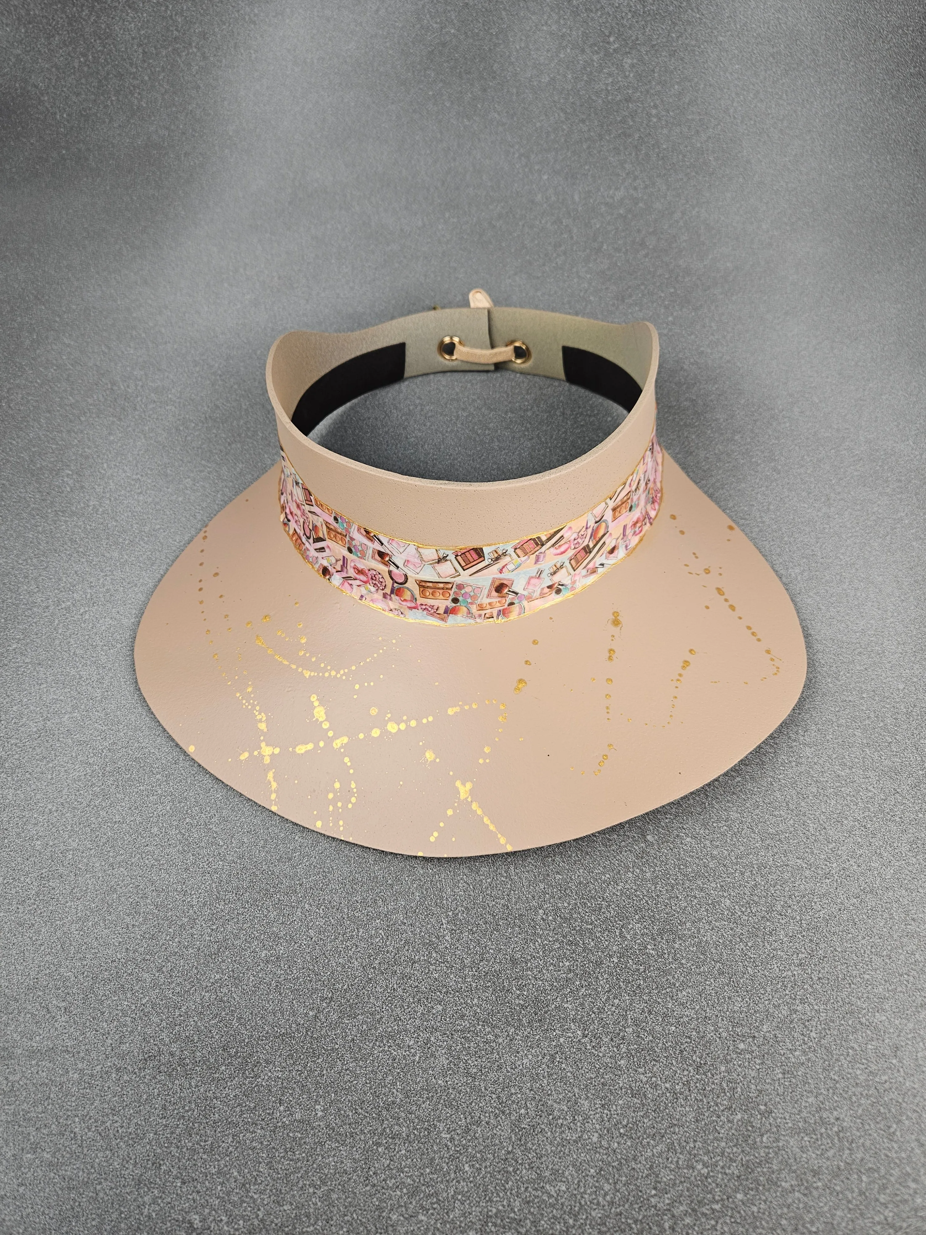 Peachy Beige "LadyEVA" Visor Hat with Cosmetic Themed Collage Band and Golden Paint Splatter Effect