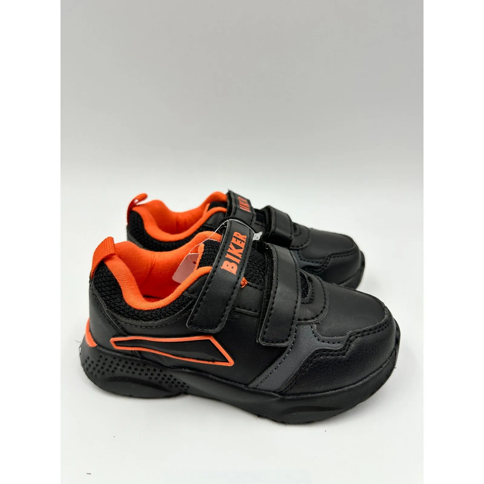 Toddler Size 7, Black Sneakers with Orange Trim, Straps with Biker Design